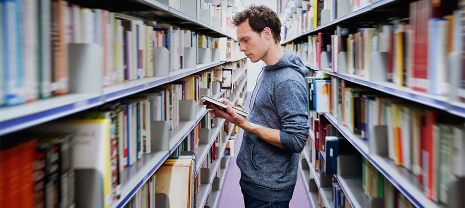 male student in library